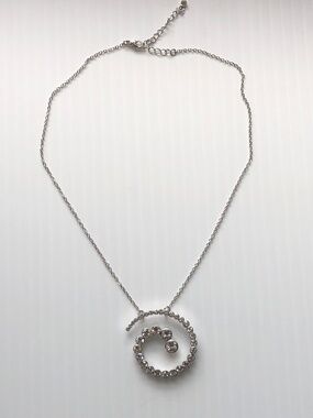 Vintage Butler silver crystal swirl necklace